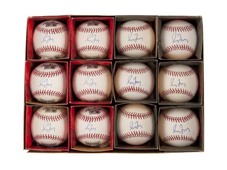 Lot of (12) Greg Maddux Signed Baseballs (MLB Authenticated)